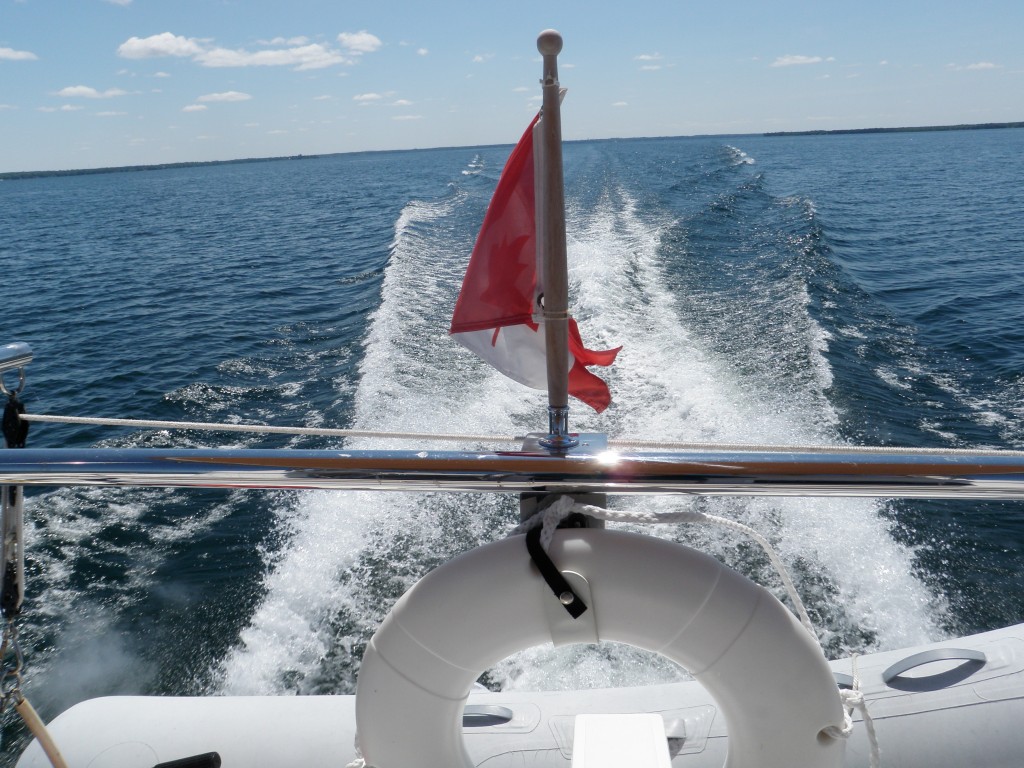 Racing across Lake Simcoe at WOT (22.3 mph), to burn off engine carbon deposits (at least, that's the Captain's excuse).